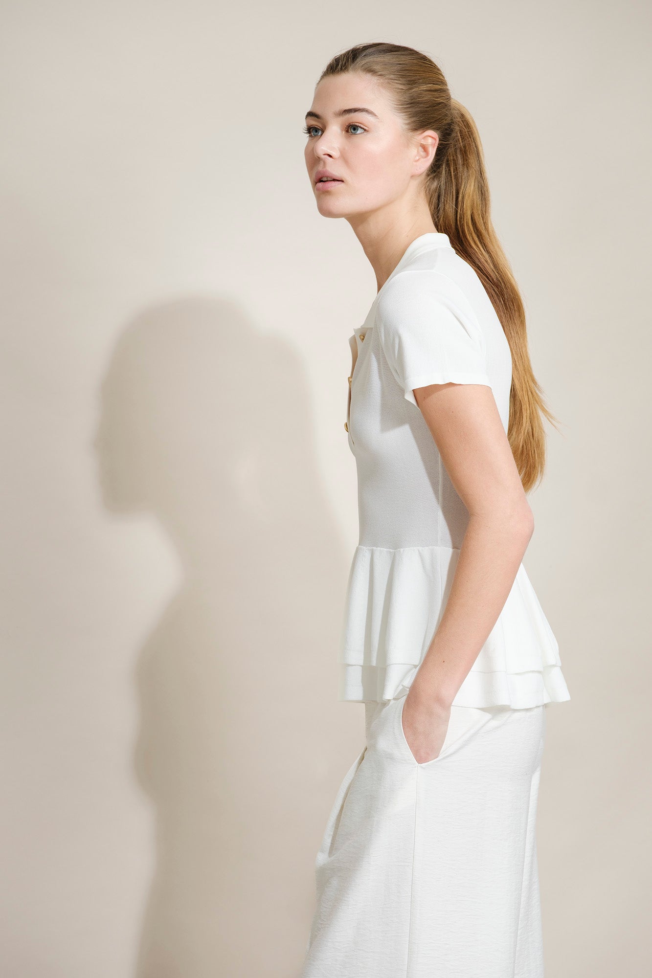 POLO EM MALHA COM PEPLUM