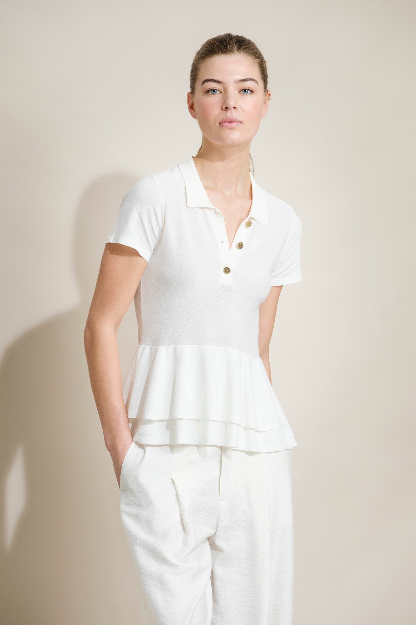 POLO EM MALHA COM PEPLUM