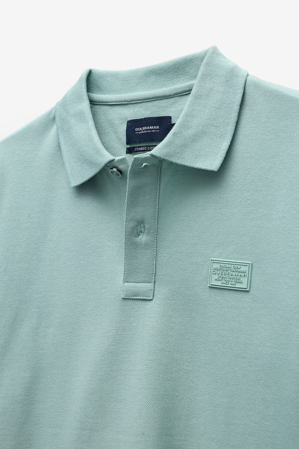 POLO PIQUET COM BADGE