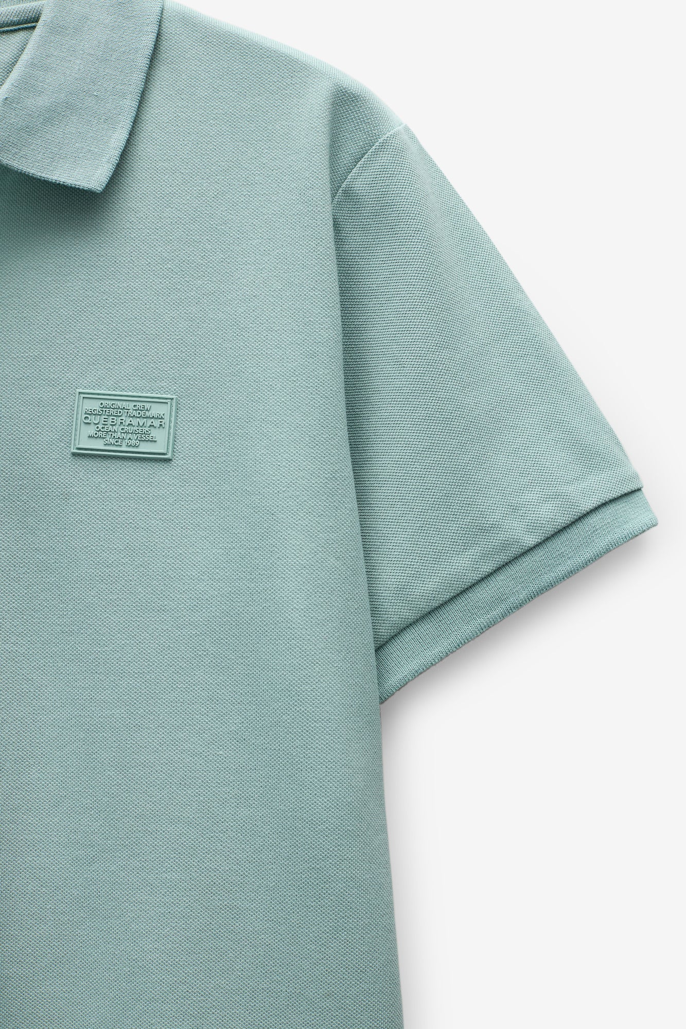 POLO PIQUET COM BADGE