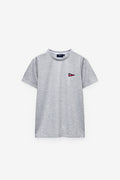 T-SHIRT COM BADGE