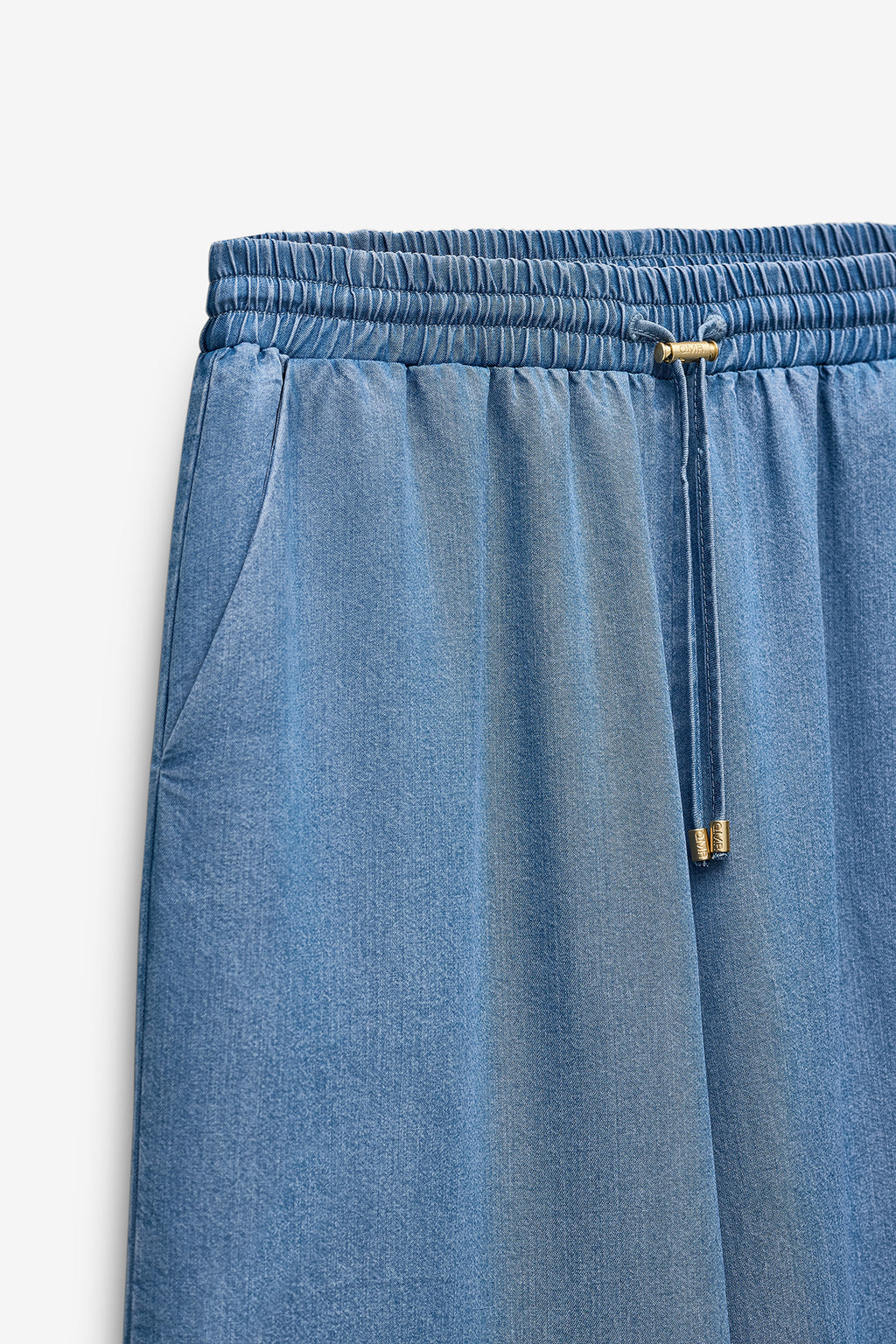 CALÇAS EM CHAMBRAY COM ELÁSTICO NA CINTURA