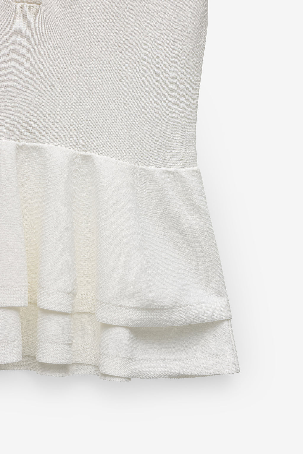 POLO EM MALHA COM PEPLUM